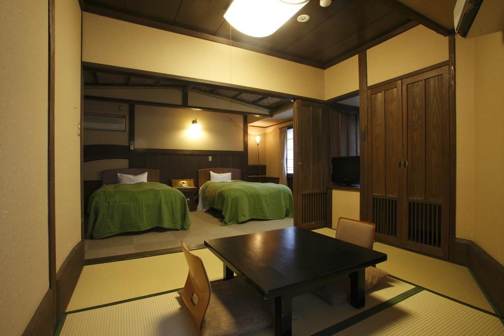 Oyado Kurokawa Hotel Aso Quarto foto