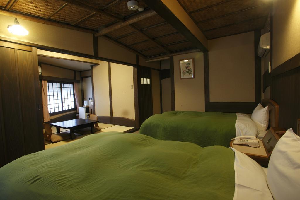 Oyado Kurokawa Hotel Aso Quarto foto
